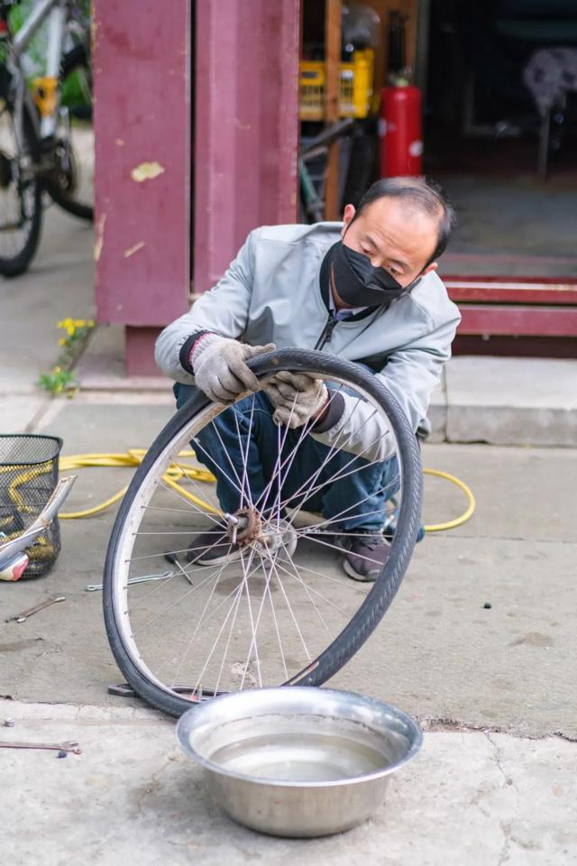 天悦平台APP16年，他在北大修了50万辆自行车……